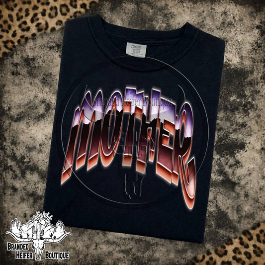 Chrome Mother Graphic Tee in Black, arched chrome Mother lettering with purple and copper reflections, printed on a Comfort Colors tee