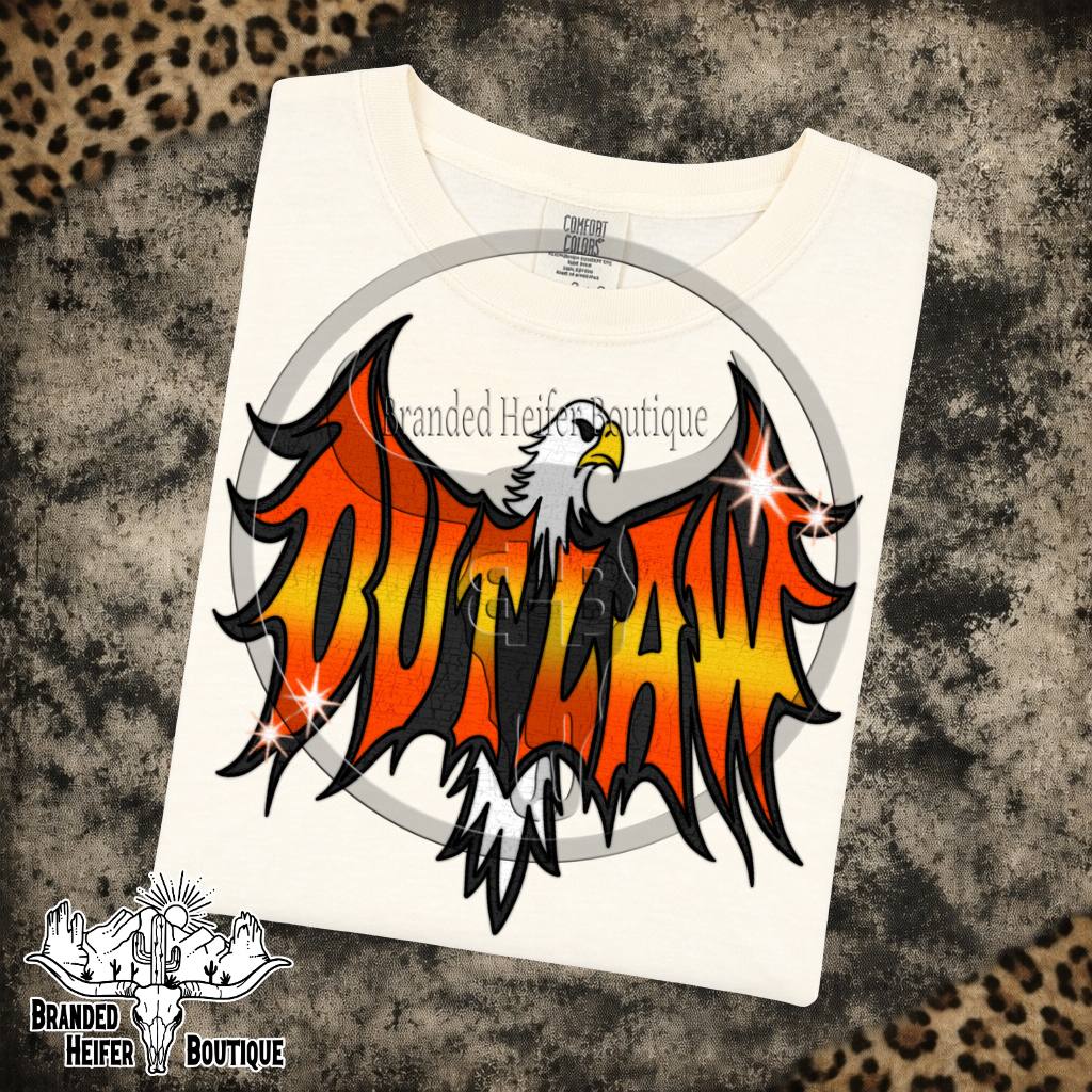Outlaw Eagle Flame Graphic Tee in Ivory, bald eagle with fiery orange Outlaw wings, printed on a Comfort Colors tee