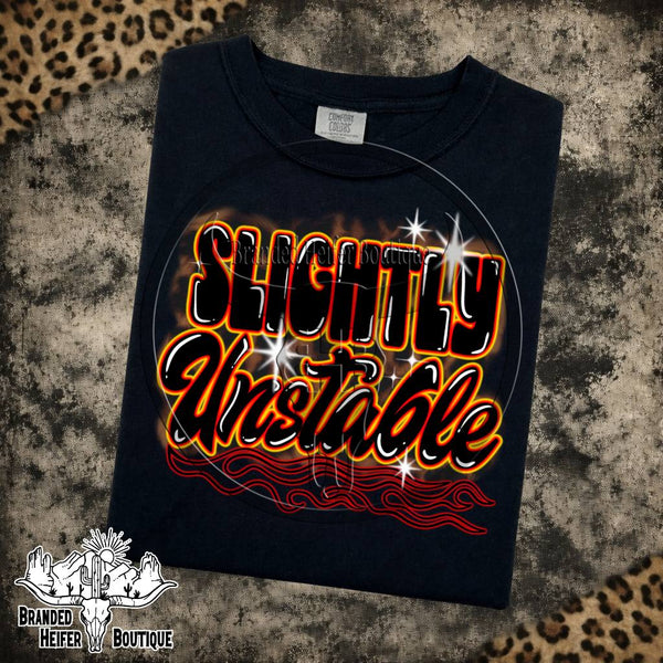 Slightly Unstable Graphic Tee in Black, Slightly Unstable lettering with orange glow and red pinstripe flames, printed on a Comfort Colors tee